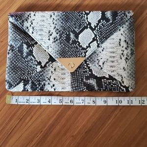 Faux snake skin clutch